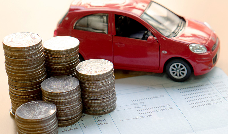 Red car and deck of coins